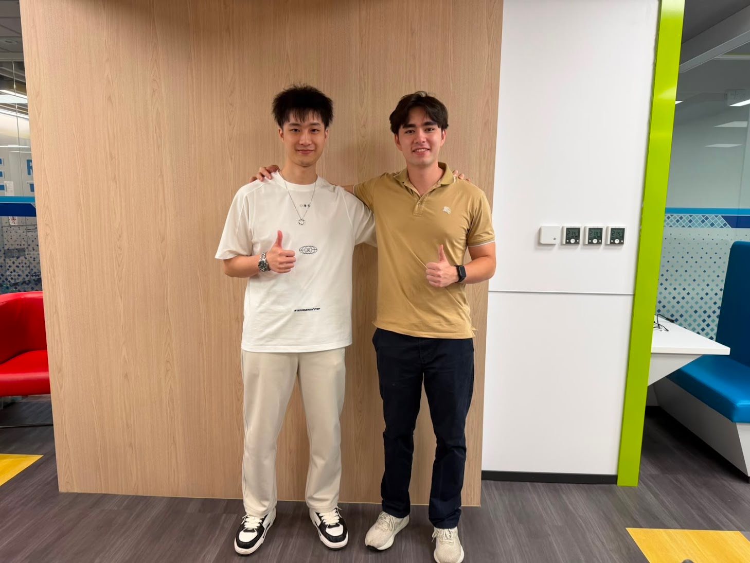 Gavin and a labmate giving thumbs up in the HKUST lab